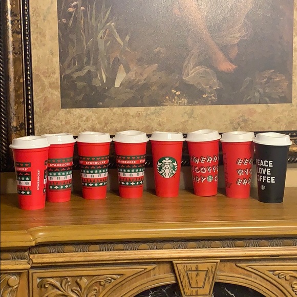 Starbucks 7 red cups and 1 black cup reusable